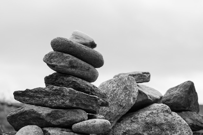 Black and white image of several stones stacked on top of each other