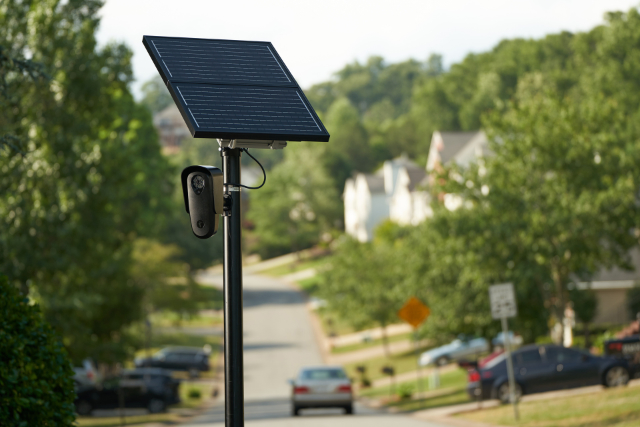 A Flock Safety camera on a pole 